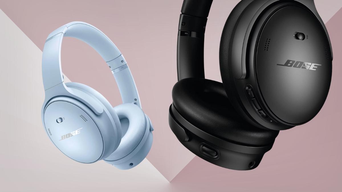 Two Bose QuietComfort noise cancelling headphones in black and light blue shown on a soft pink background.